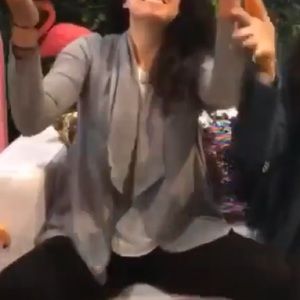 Grey swing sweater with cowl neck and zip front